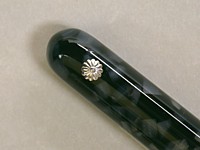 Silver Flower Pen Prop (close-up)